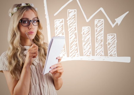 Digital composite of Woman with flowers in hair and notebook against white graph and cream backgroundの写真素材