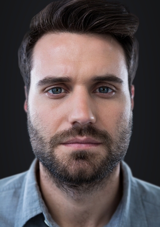 Digital composite of Close up of man's face against dark grey backgroundの写真素材