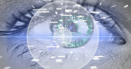 Digital composite of Eye looking at futuristic interface