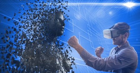 Digital composite of Man wearing virtual glasses while punching 3d human