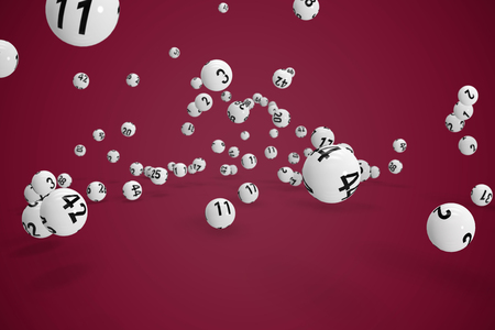 Falling lottery balls  against pink backgroundの写真素材