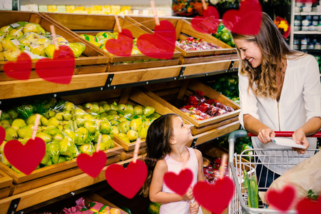 Hearts on line against mother and daughter doing shoppingの写真素材