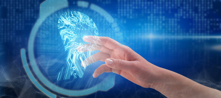 Close-up of cropped hand on white background against human face against circuit boardの写真素材