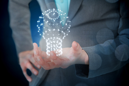 Businesswoman gesturing against white background against glowing backgroundの写真素材