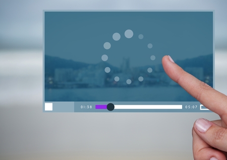 Digital composite of Hand touching Video Player App Interface