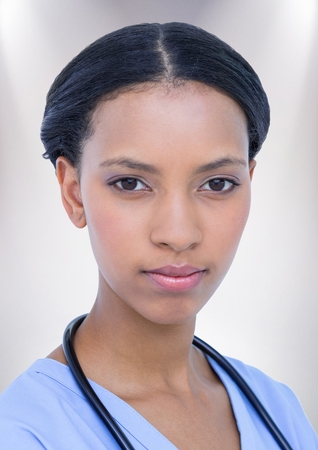 Digital composite of Close up of female doctor against white backgroundの写真素材