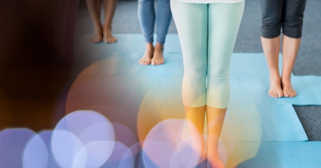 Digital composite of Low section of people standing on exercise matの写真素材