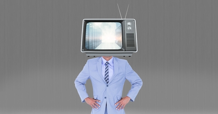 Digital composite of Digital composite image of television on businessman's headの写真素材