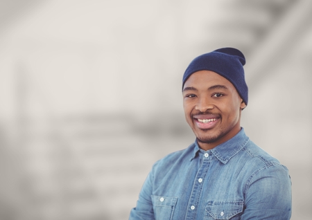 Digital composite of Portrait of smiling man wearing knit hatの写真素材