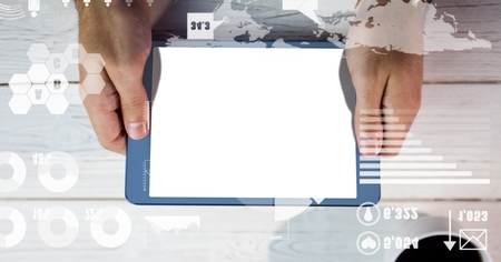 Digital composite of Directly above shot of person holding tablet PC with blank screenの写真素材