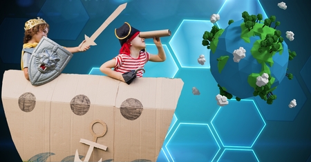 Digital composite of Kids in costume by low poly earthの写真素材