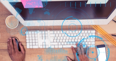 Digital composite of Hands using computer in office