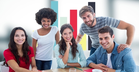 Digital composite of Casual business people smiling against graph