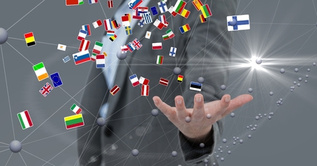 Digital composite of Various flags flying over business person's hand