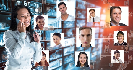 Digital composite of Businesswoman using mobile phone by portraitsの写真素材