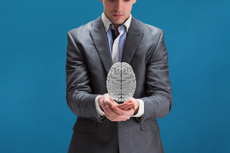 Digital composite of Brain on hands
