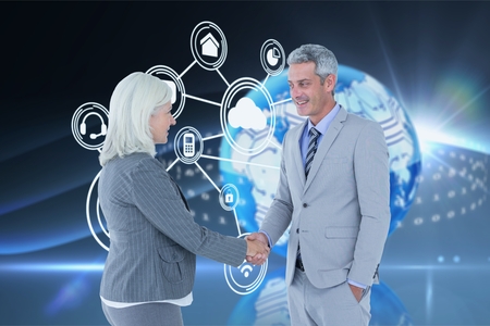 Business partners shaking their hands