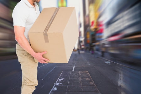 Digital composite of delivery man torsoの写真素材