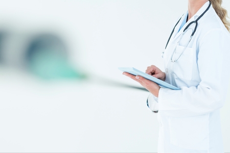 Digital composite of doctor torsoの写真素材