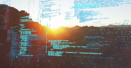 Digital composite of Blue code against mountain and sunsetの写真素材