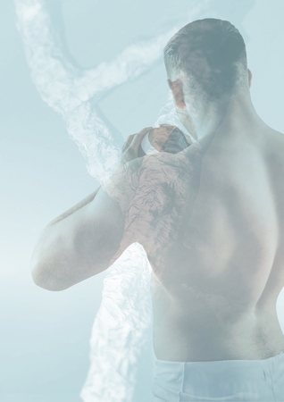 Digital composite of Rugby player with ball and dna chain with superpositionの写真素材