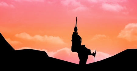 Digital composite of Silhouette hand holding drill machine against skyの写真素材