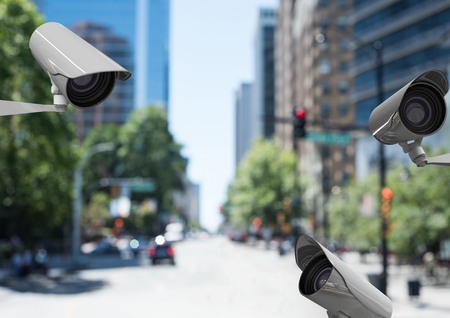 Digital composite of 3 CCTV controlled the street in a blurred road during the dayの写真素材