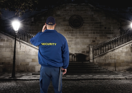 Digital composite of security guard guarding the park at night