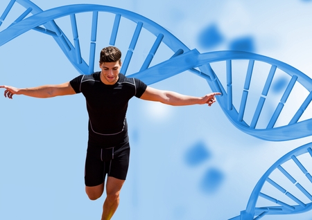 Digital composite of runner with blue dna chain backgroundの写真素材