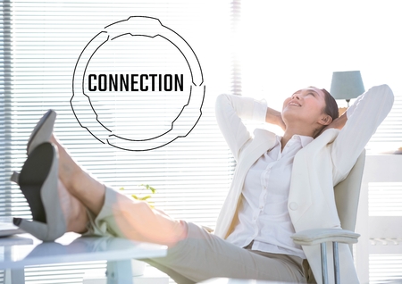 Digital composite of Black connection text and graphic against business woman at laptop next to bright windowの写真素材