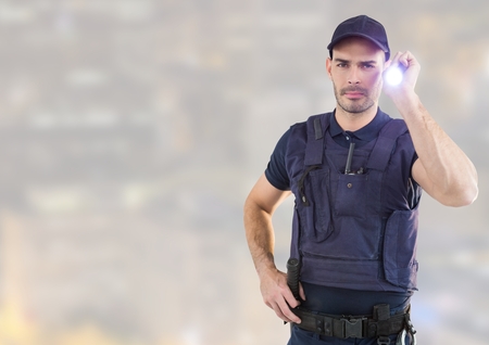 Digital composite of Security man outside bright background in night cityの写真素材