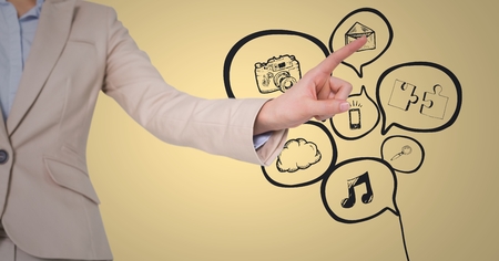 Digital composite of Business woman mid section pointing at grey business graphic against yellow backgroundの写真素材