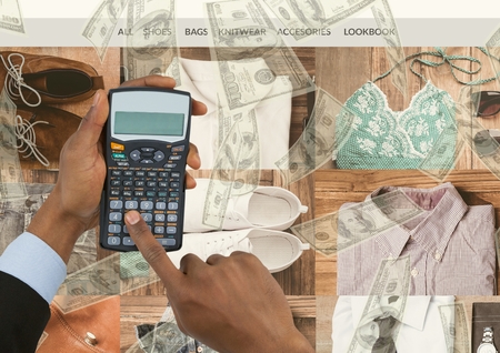 Digital composite of Double exposure of cropped hands using calculator with fashion accessories and currenciesの写真素材