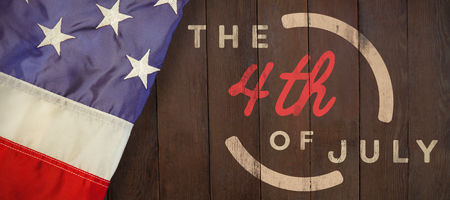 Colorful happy 4th of july text against white background against wood panellingの写真素材