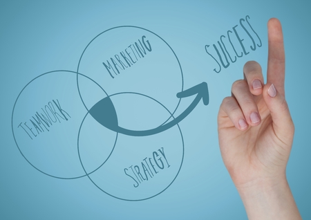 Digital composite of Hand pointing at ven diagram doodles against blue backgroundの写真素材