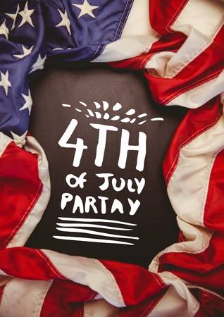 Digital composite of White fourth of July party graphic against chalkboard and american flagの写真素材