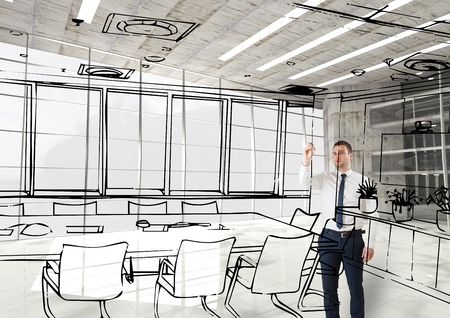 Digital composite of business man 3D drawing fictitious  office lines in the officeの写真素材