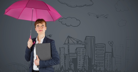 Digital composite of Business woman with umbrella against grey background with 3D city doodleの写真素材
