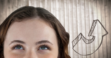 Digital composite of Top of woman's head next to 3D brown arrow against blurry wood panelの写真素材