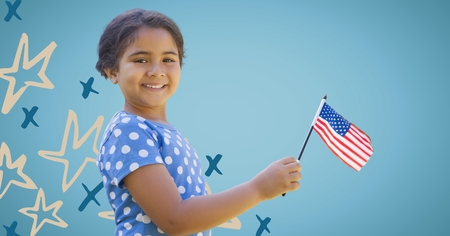Digital composite of Girl smiling and holding american flag against blue background with hand drawn star patternの写真素材