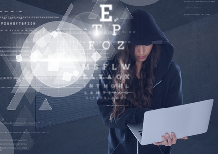 Digital composite of Woman hacker using a laptop in front of 3d digital background