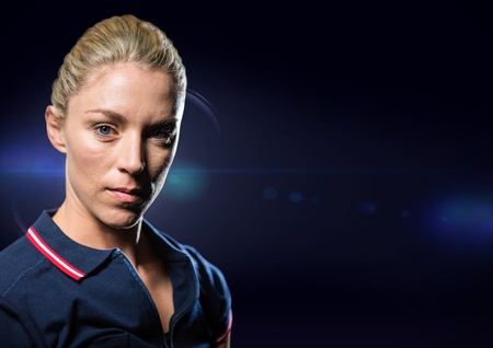 Digital composite of Female athlete against blue flareの写真素材