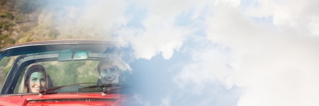 Digital composite of Couple in car with transition effect and copy spaceの写真素材