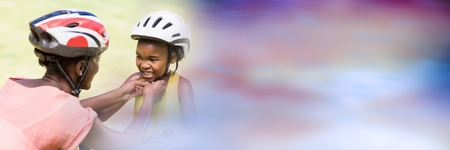 Digital composite of Mother fixing daughter helmet and blurry purple transition 3dの写真素材