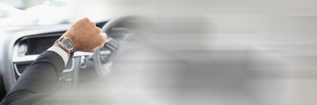 Digital composite of Looking at watch time in car with transition effect 3dの写真素材