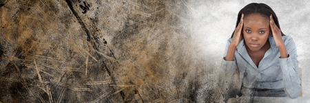 Digital composite of Frustrated business woman at desk and brown grunge copy space transitionの写真素材