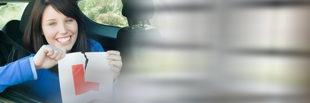 Digital composite of Woman In car ripping L learning sign with copy space transitionの写真素材