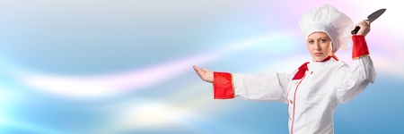Digital composite of Chef holding knife with blurred backgroundの写真素材