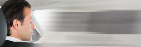 Digital composite of Man in car with transition effectの写真素材