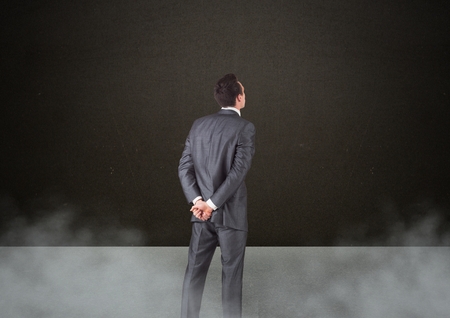 Digital composite of Back of Man Looking at vignetteの写真素材